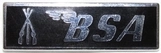 (image for) Badge, lapel, BSA , silver on black, piled arms, rectangular
