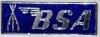 (image for) Badge, lapel, BSA , silver on blue, piled arms, rectangular